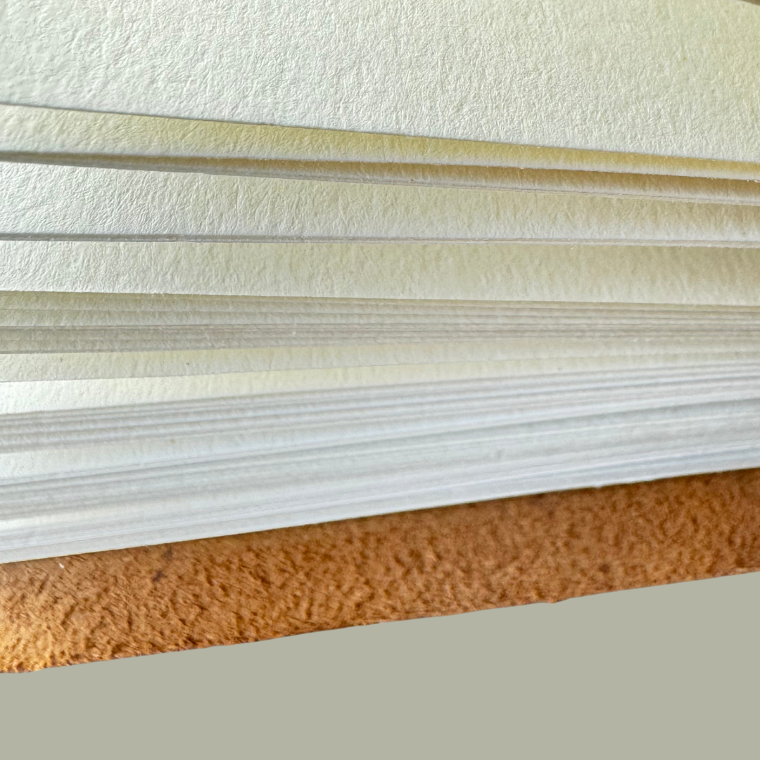 Macro shot highlighting the texture and quality of the blank pages inside the personalised journal