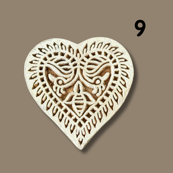 Elva heart wooden stamp on a beige background