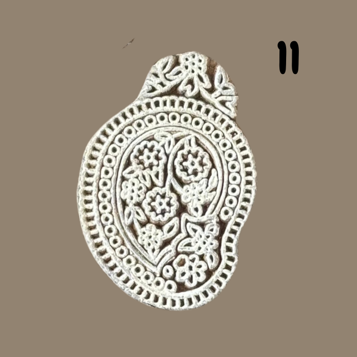 Elva wooden stamp on a beige background