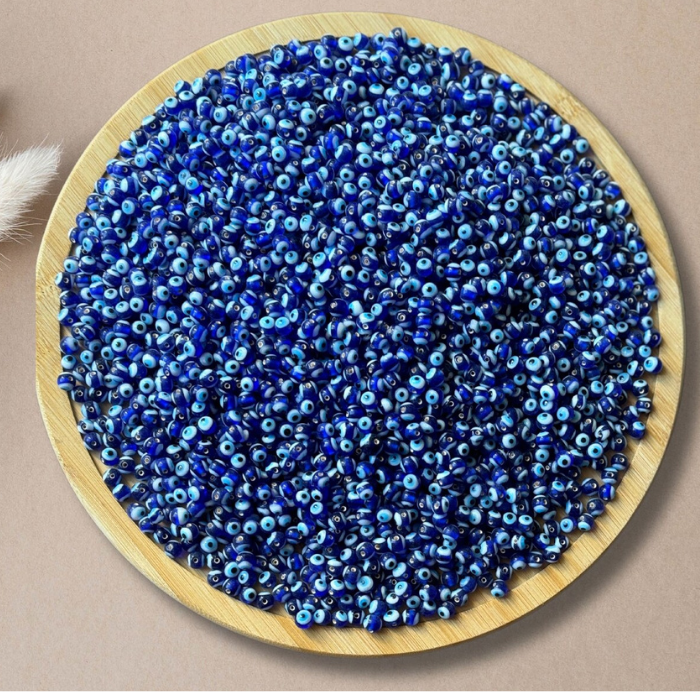 Evil Eye beads on a round dish used for jewellery making etc.