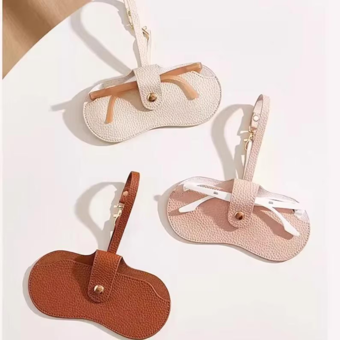 Showing 3 pairs of Glasses Case Personalised in cream, pink and brown colour.