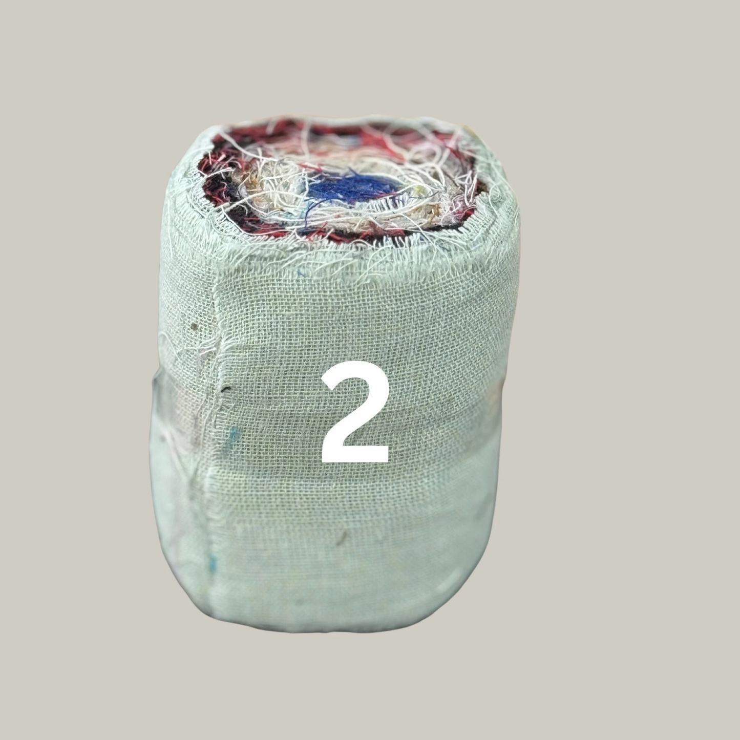 Linen tape on a grey background