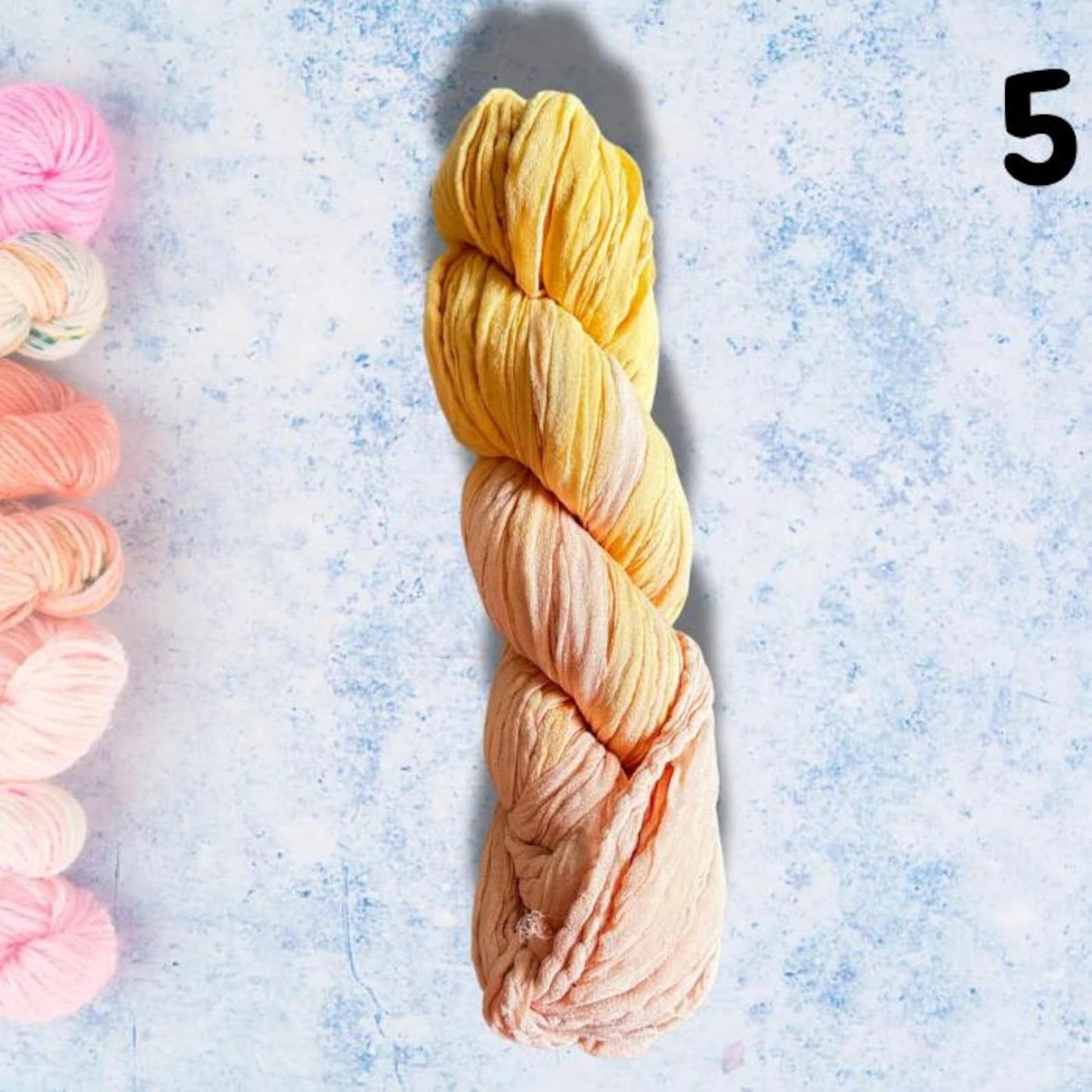 Peach Silk chiffon ribbon on a blue background