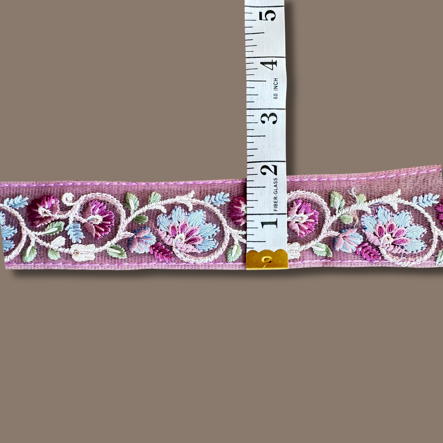 Measuring Pink Embroidered trim 1.5 inches approximately
