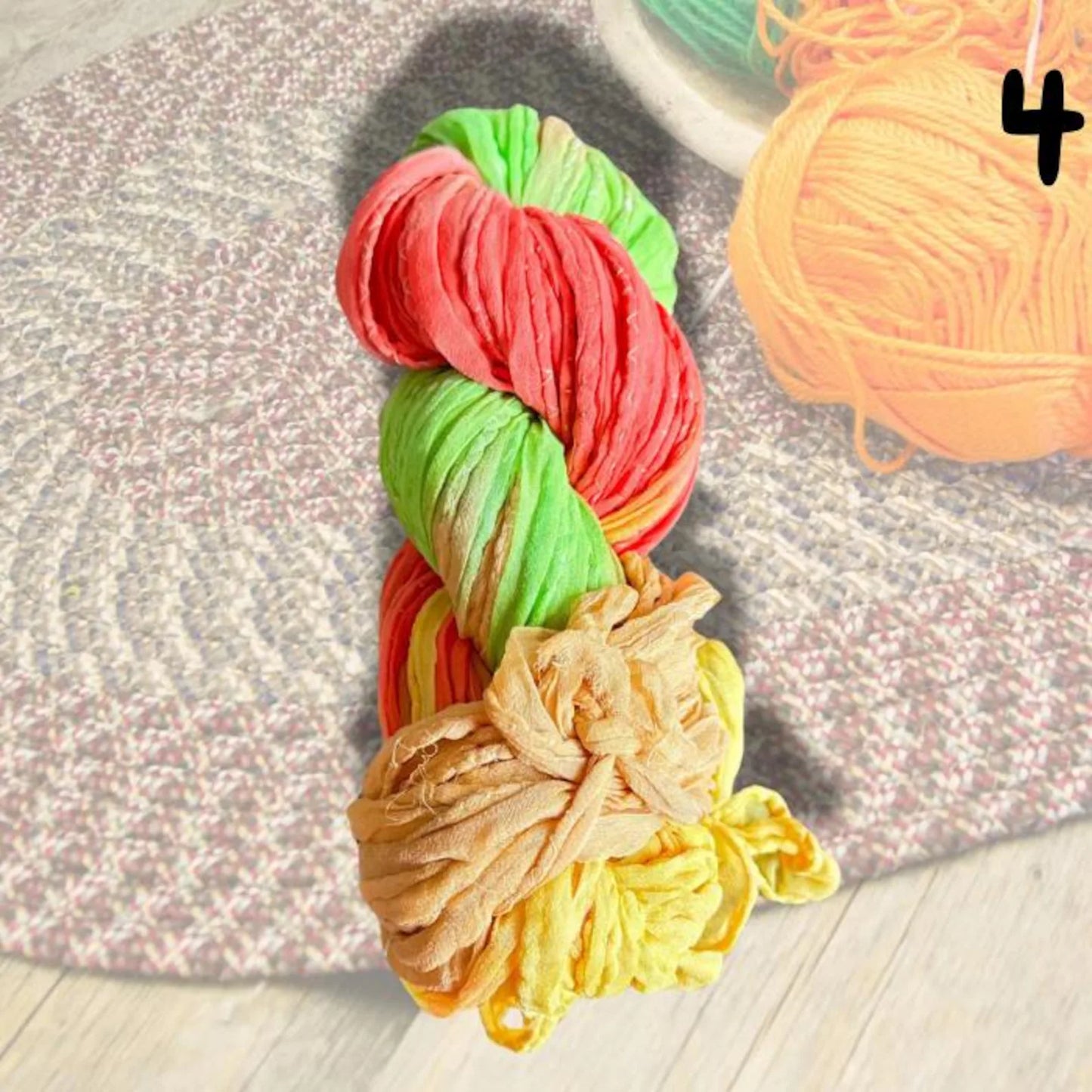 Red Green Silk chiffon ribbon on an asthetic background with wool on side