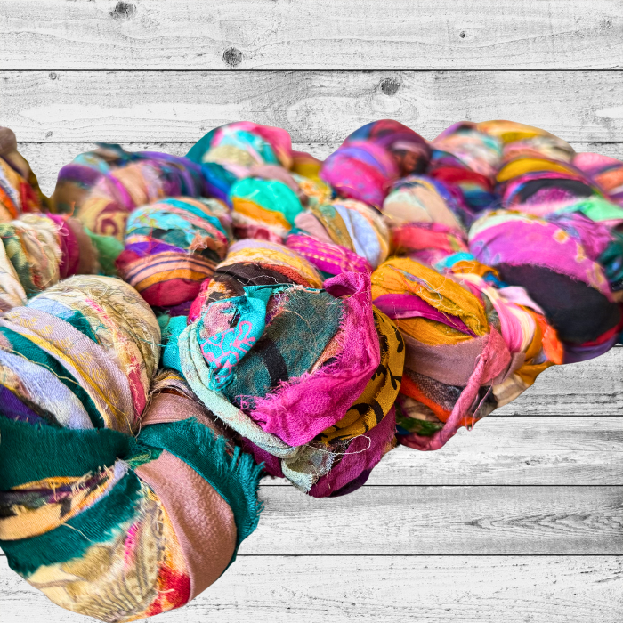 Sari silk ribbon on a grey background