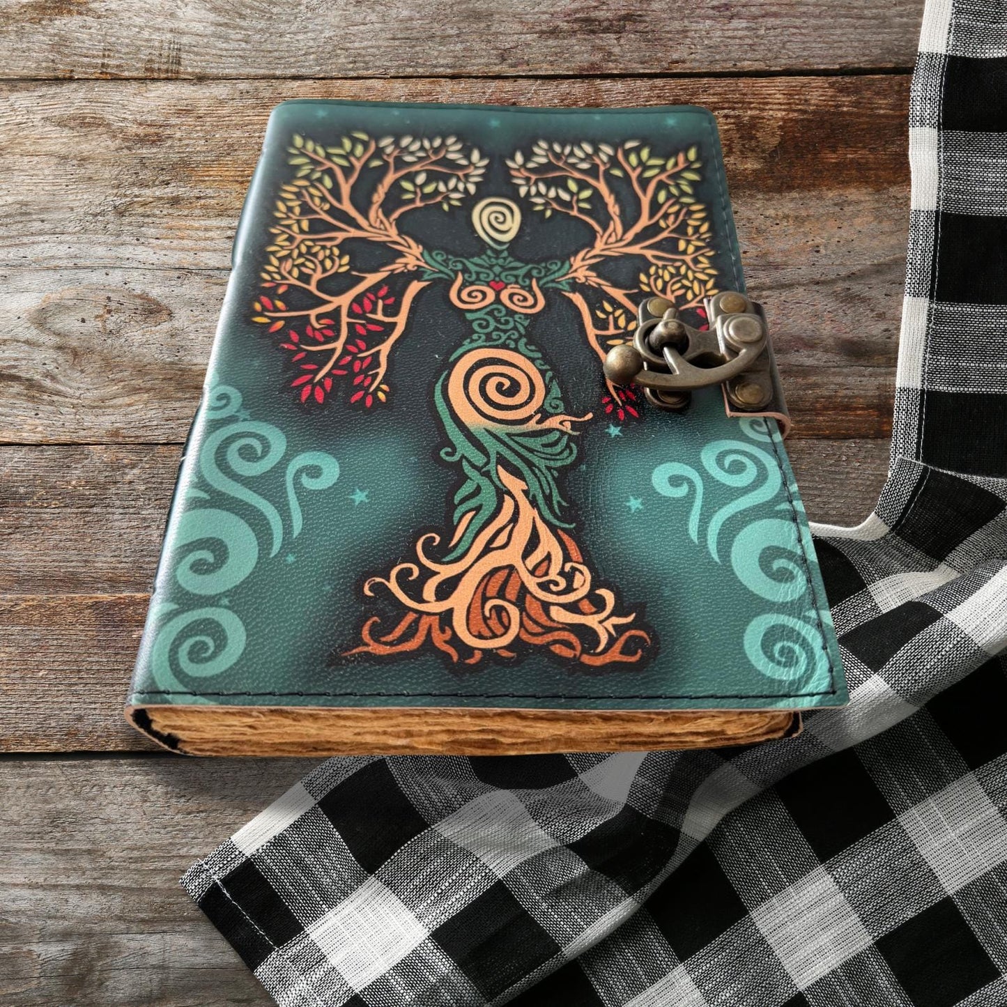 Tree of Life journal on a wooden table