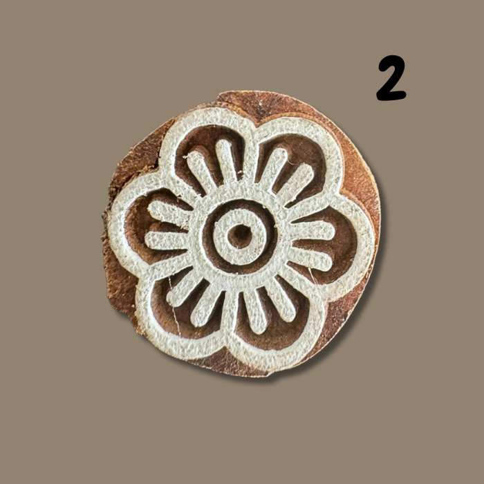 Wooden stamp blocks on a beige background