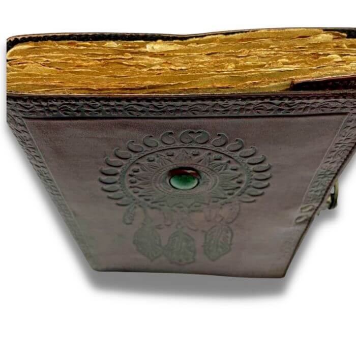 Top view of Brown leather journal with Embossed dream catcher design