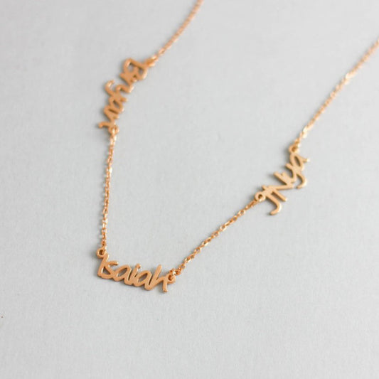 Alma personalised necklace rose gold with 3 names on a white background