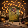 Green leather-look Valentine journal with illustrated cover and hanging cord tie