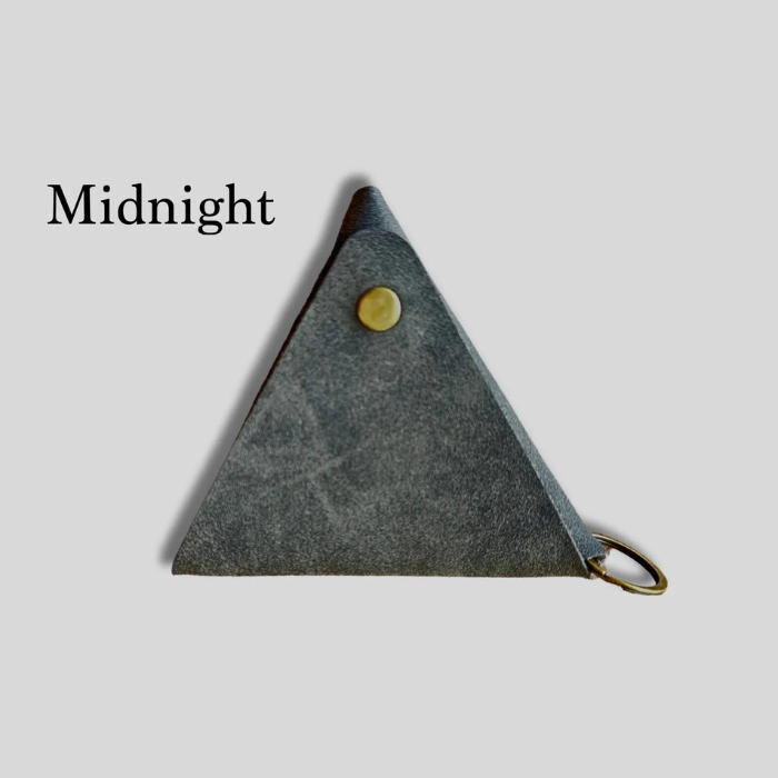 Midnight triangle coin purse with gold-tone snap button and metal loop ring.