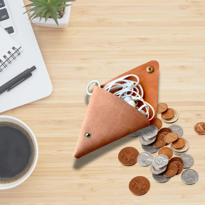 Showing the Tan (Brown) Mini Coin Purse with earbuds and coins