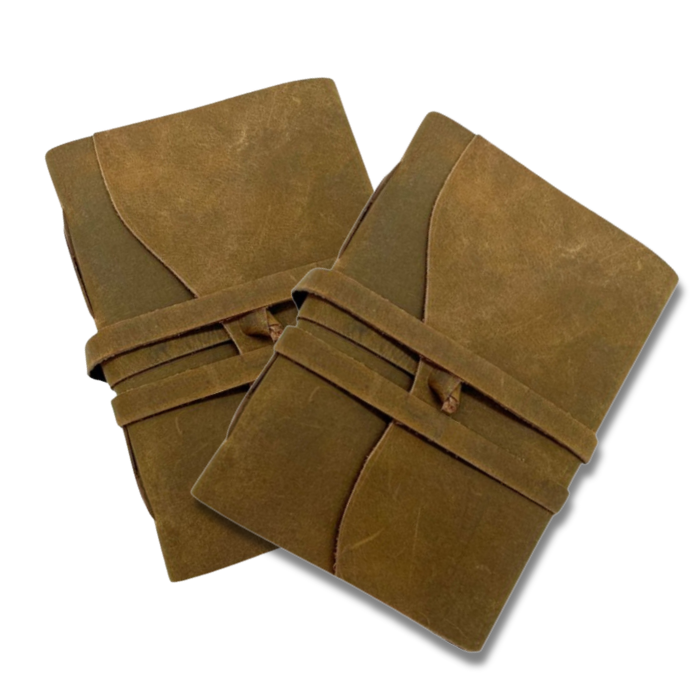 2 Brown leather journal side by side on a white background