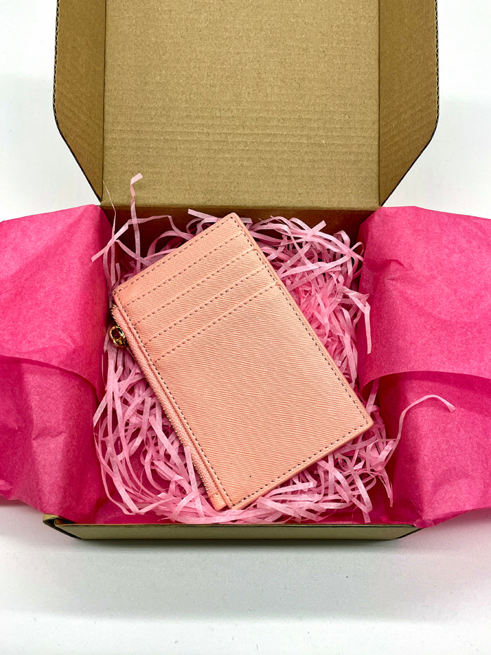 Blush pink personalized card wallet with gold zipper and multiple card slots