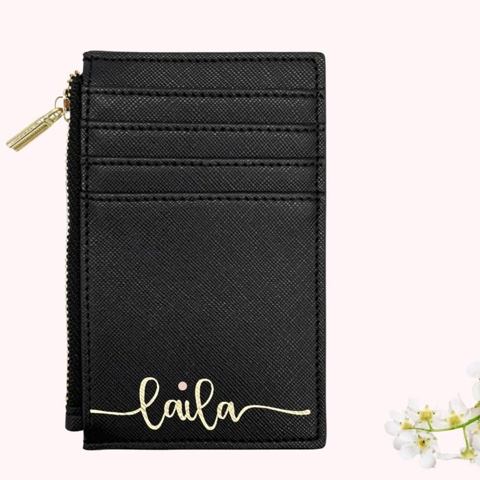 Black personalized card wallet with gold zipper and script name on front