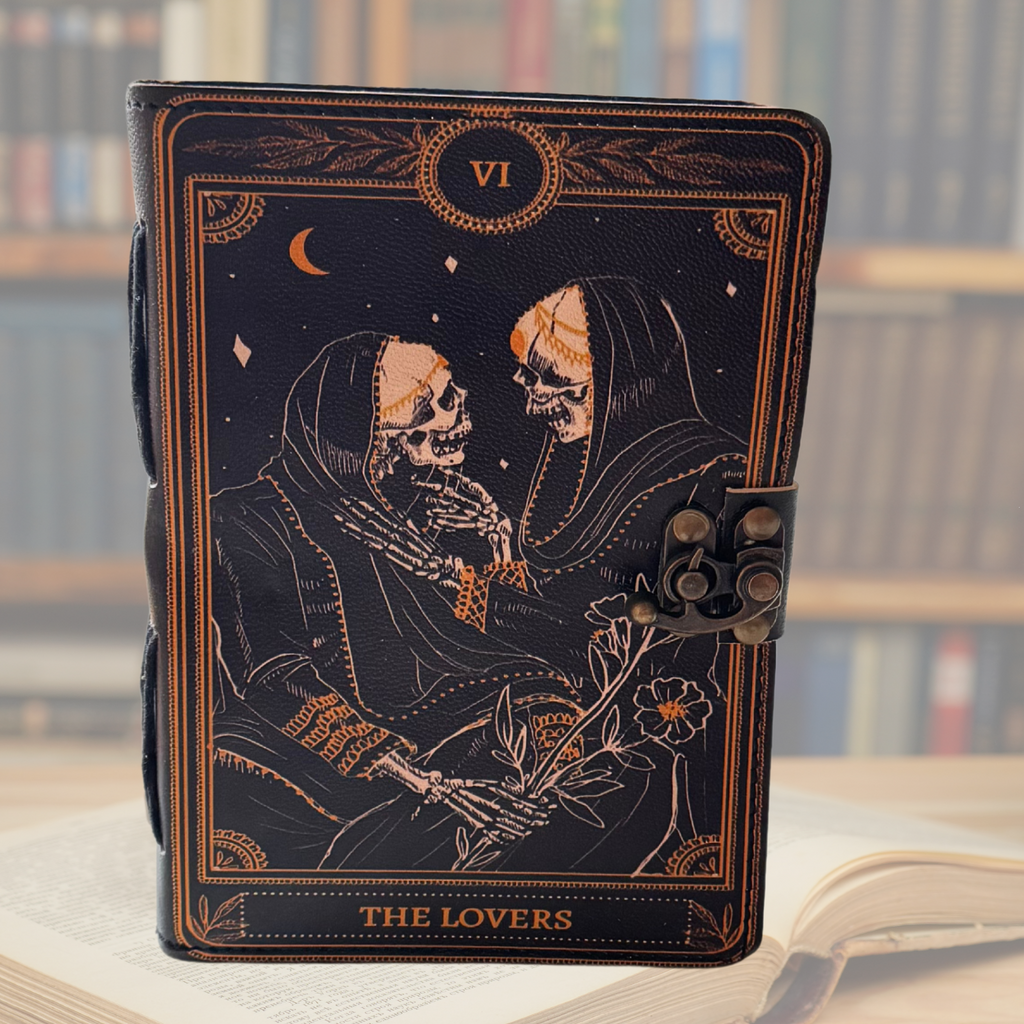 Embossed leather journal on a light background with a book library