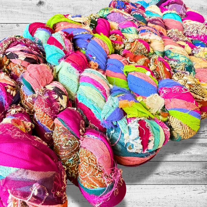 Embroidered Silk Chiffon Ribbon on a grey background