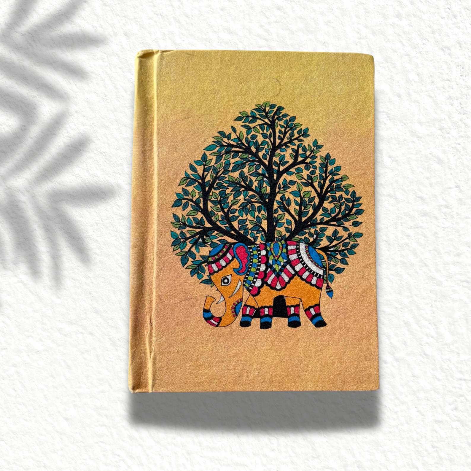 Handmade paper journal on an asthetic white background