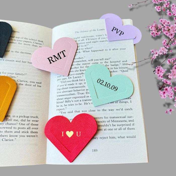 Heart corner bookmark set with pink, purple and red heart tags and raised fabric texture.