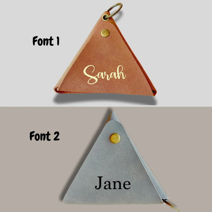 Personalised triangle coin purse with gold-tone eyelet and loop ring in tan and grey.