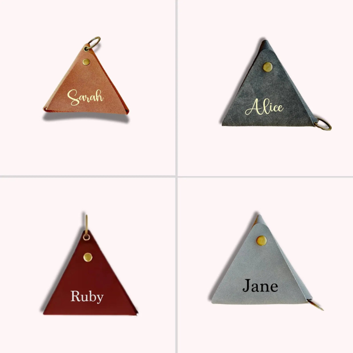 Personalised triangle coin purse with gold-tone eyelet and loop ring, multiple colors.