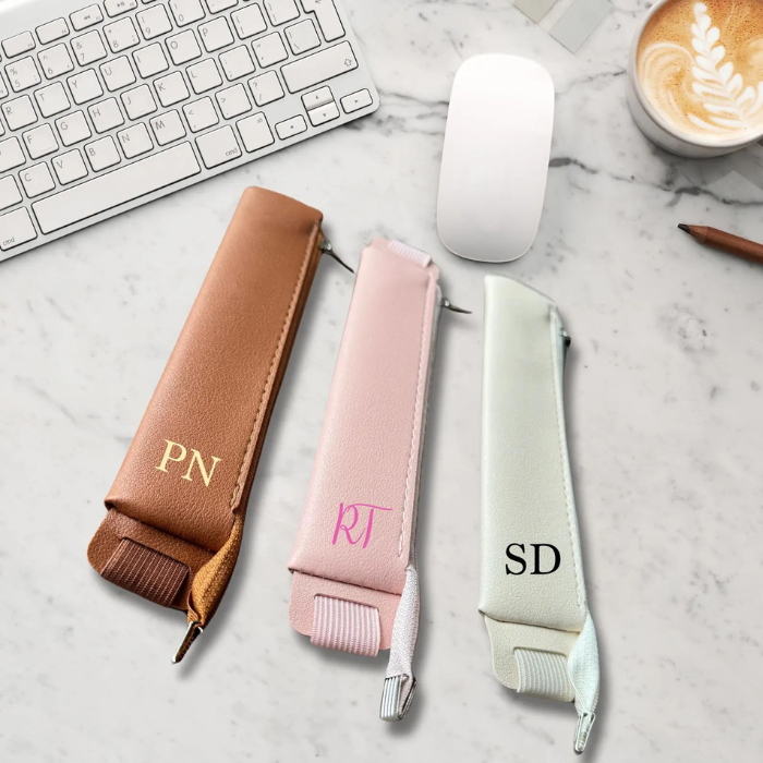 Leather pen holder  placed on a table 