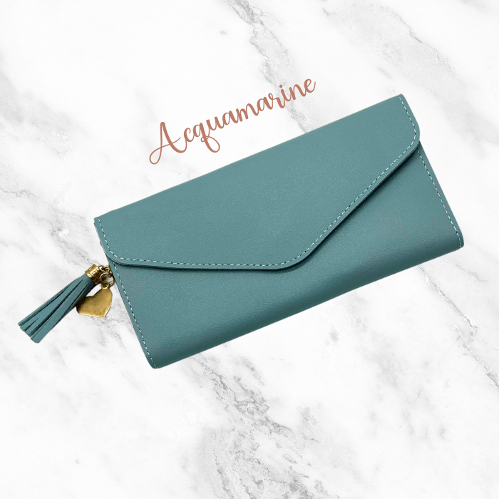 Acquamarine Leather Wallet with heart and tassel on white background