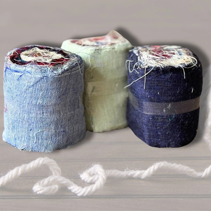 3 rolls of linen ribbon in light blue, dark blue and light green