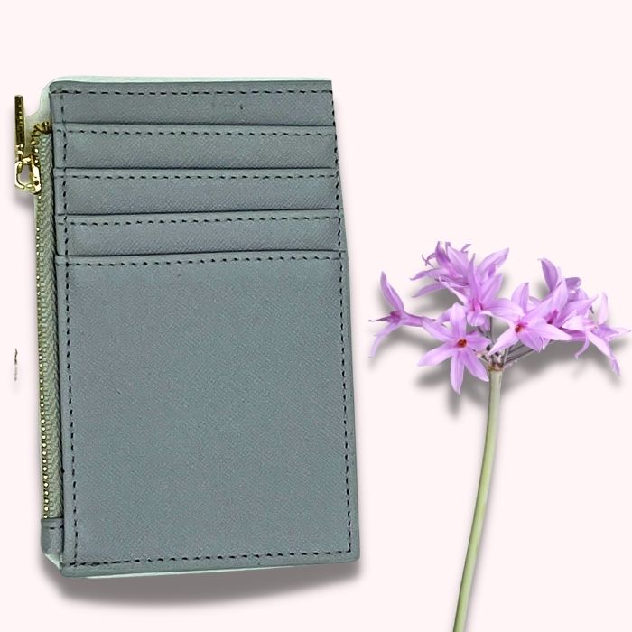 Light blue card wallet with gold zipper and multiple card slots