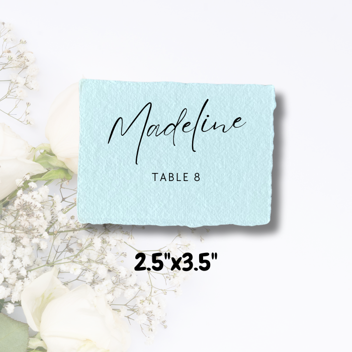 Place Cards on a pastel floral background.