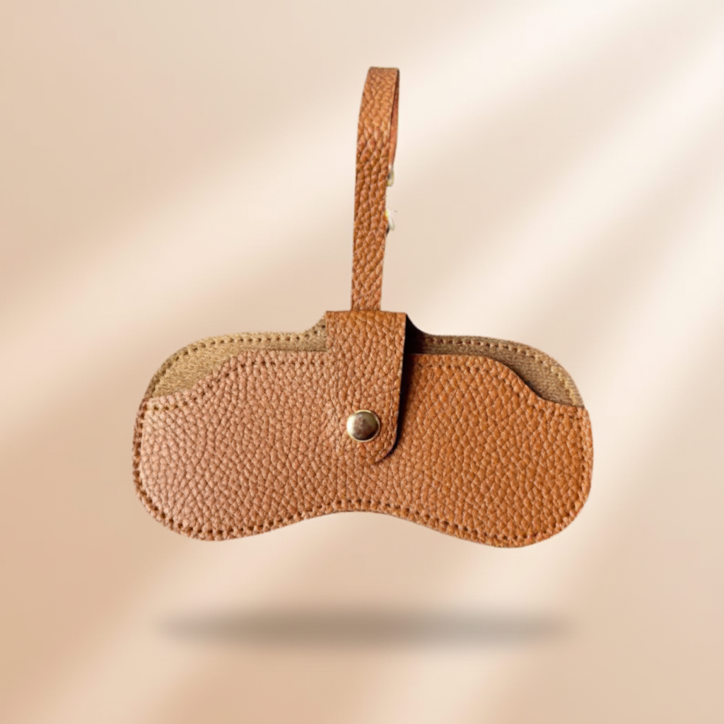 Tan Zelle personalised leather glasses case with loop strap and metal snap on warm beige background, handmade leather eyeglass case gift for her Melbourne