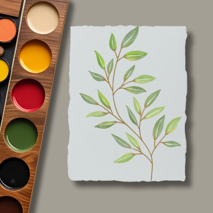 Watercolour paper, 300 GSM A4 handmade cotton, featuring a delicate watercolor painting of a branch with leaves, styled alongside a colour palette for artistic inspiration and visual appeal.