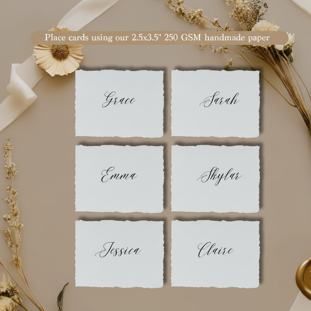 Six wedding place cards with calligraphy guest names printed on white 250 GSM handmade cotton rag paper 2.5x3.5 inch with natural deckle edges, styled with dried flowers and white satin ribbon on taupe background