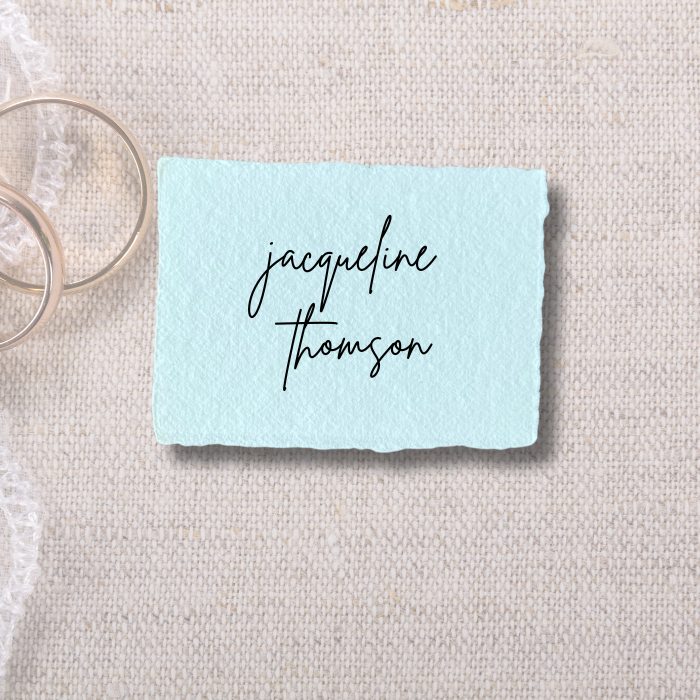 Wedding place cards on a simple background.