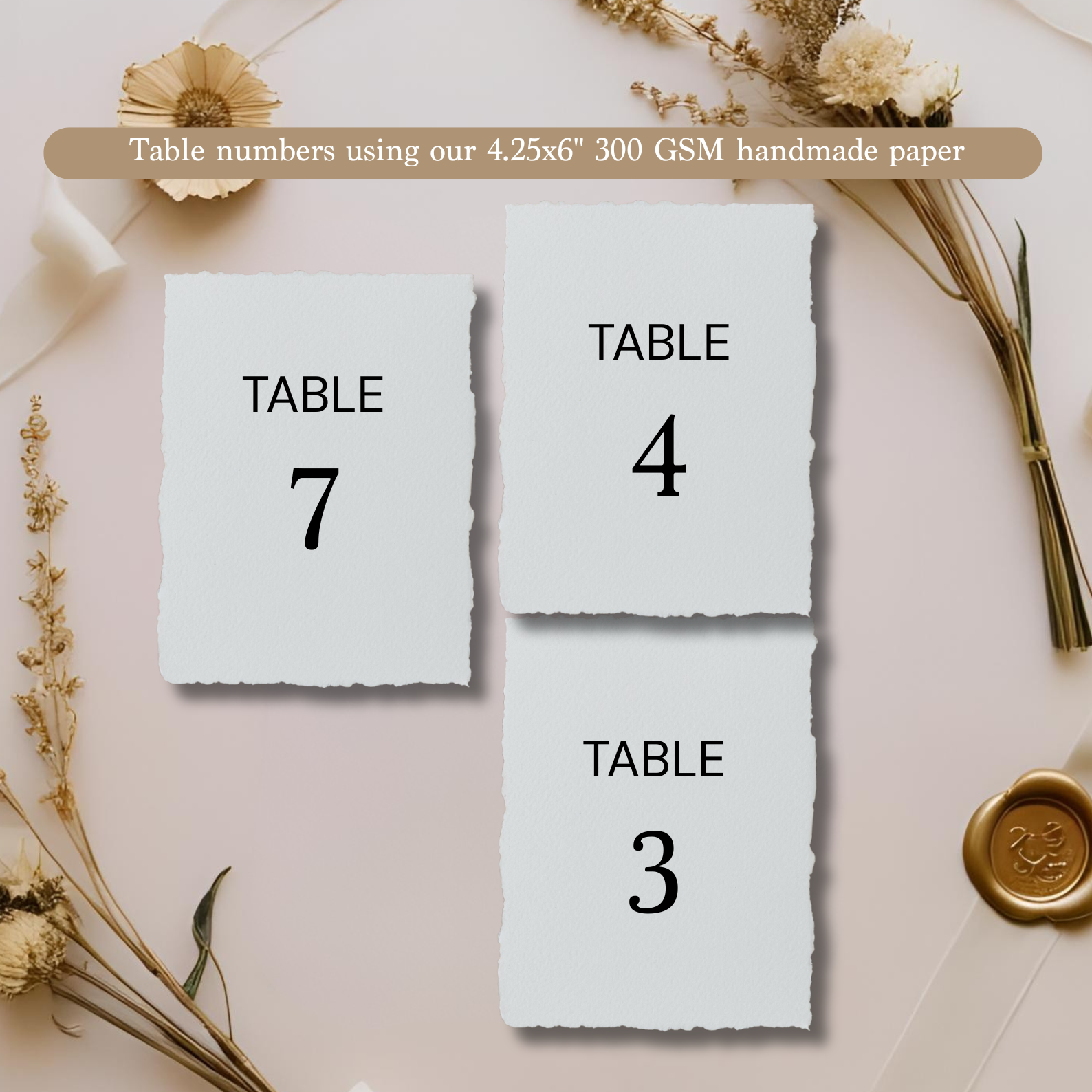 Wedding table numbers in 300 gsm handmade paper on an asthetic background