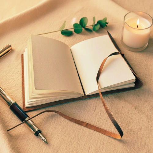 Open premium leather bound journal showing 125gsm blank pages — handmade leather journal notebook, leather journal gift